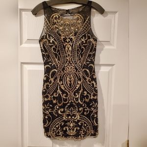 Womens size 4 black with gold beading short formal dress